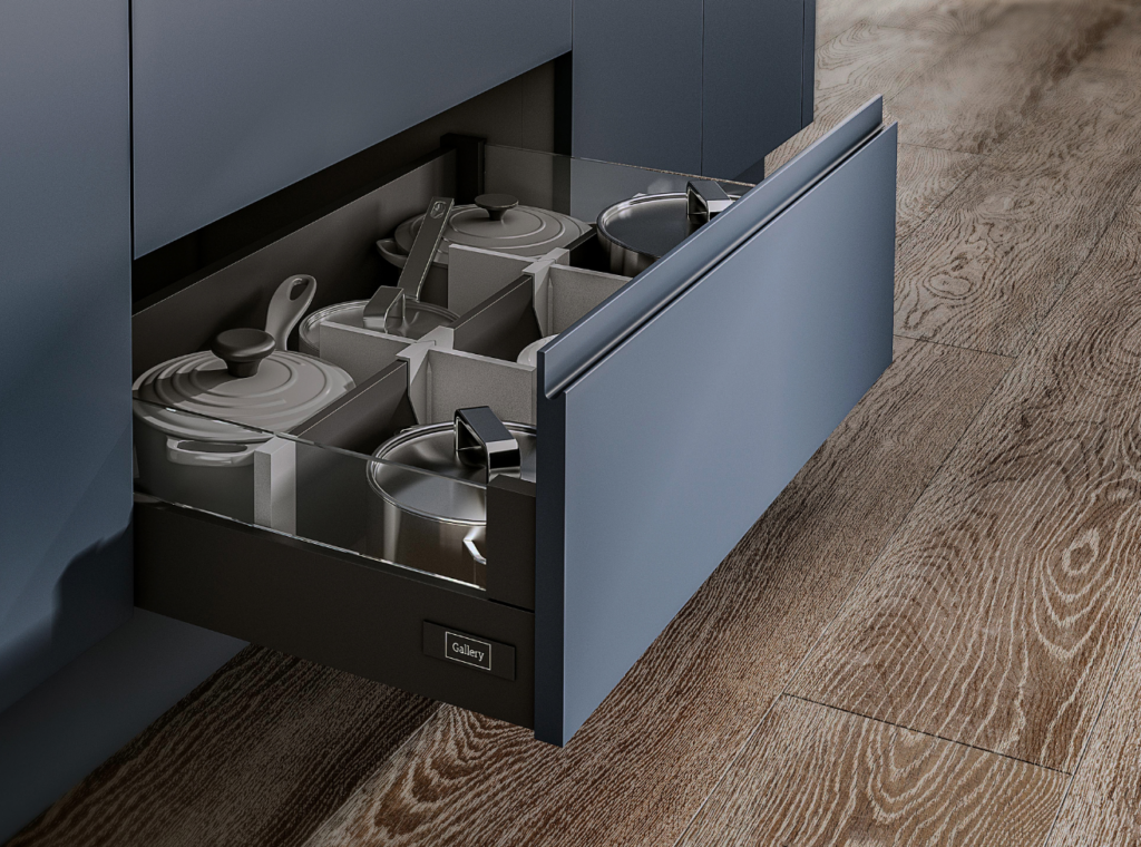Open drawer showing pots and pans organised in an New York Indigo kitchen